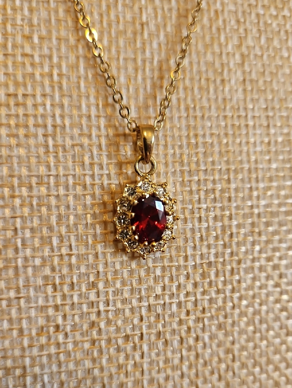 Gold-tone Necklace with Deep Red Gemstone Pendant